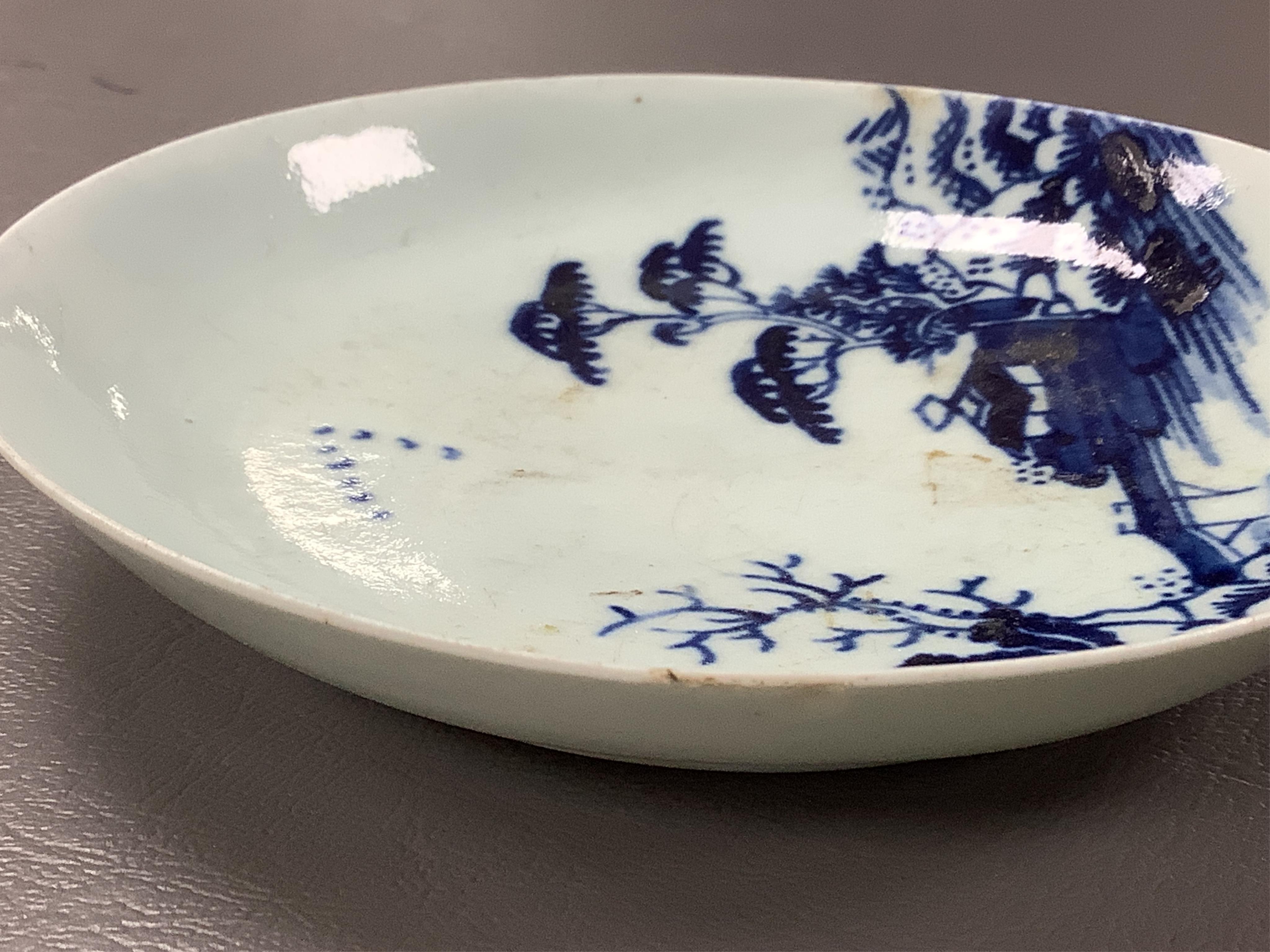 A group of 18th century Worcester and Liverpool porcelain teaware and a Caughley Cormorant fisherman butter tub and cover.